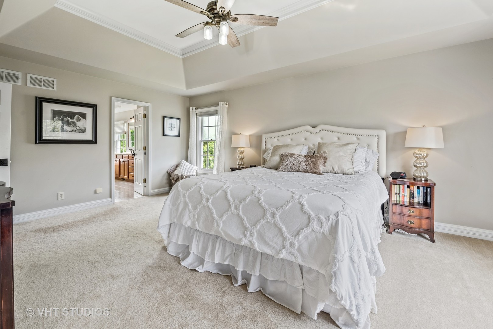 5609 Farmbrook Lane Crystal Lake, IL 60014 - Photo 14 of 35 a spacious bedroom with a bed and lamp