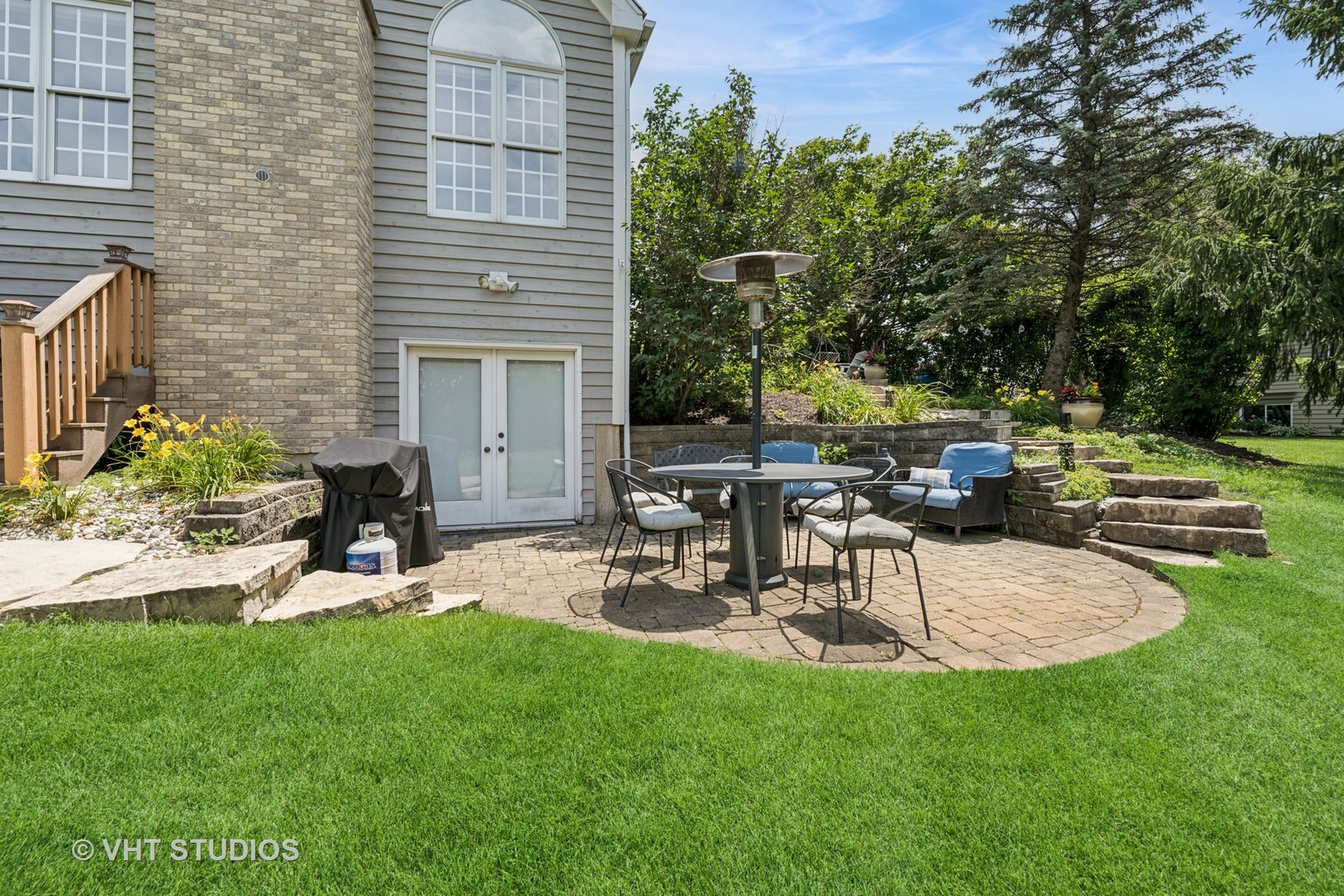 5609 Farmbrook Lane Crystal Lake, IL 60014 - Photo 28 of 35 a view of a backyard with sitting area