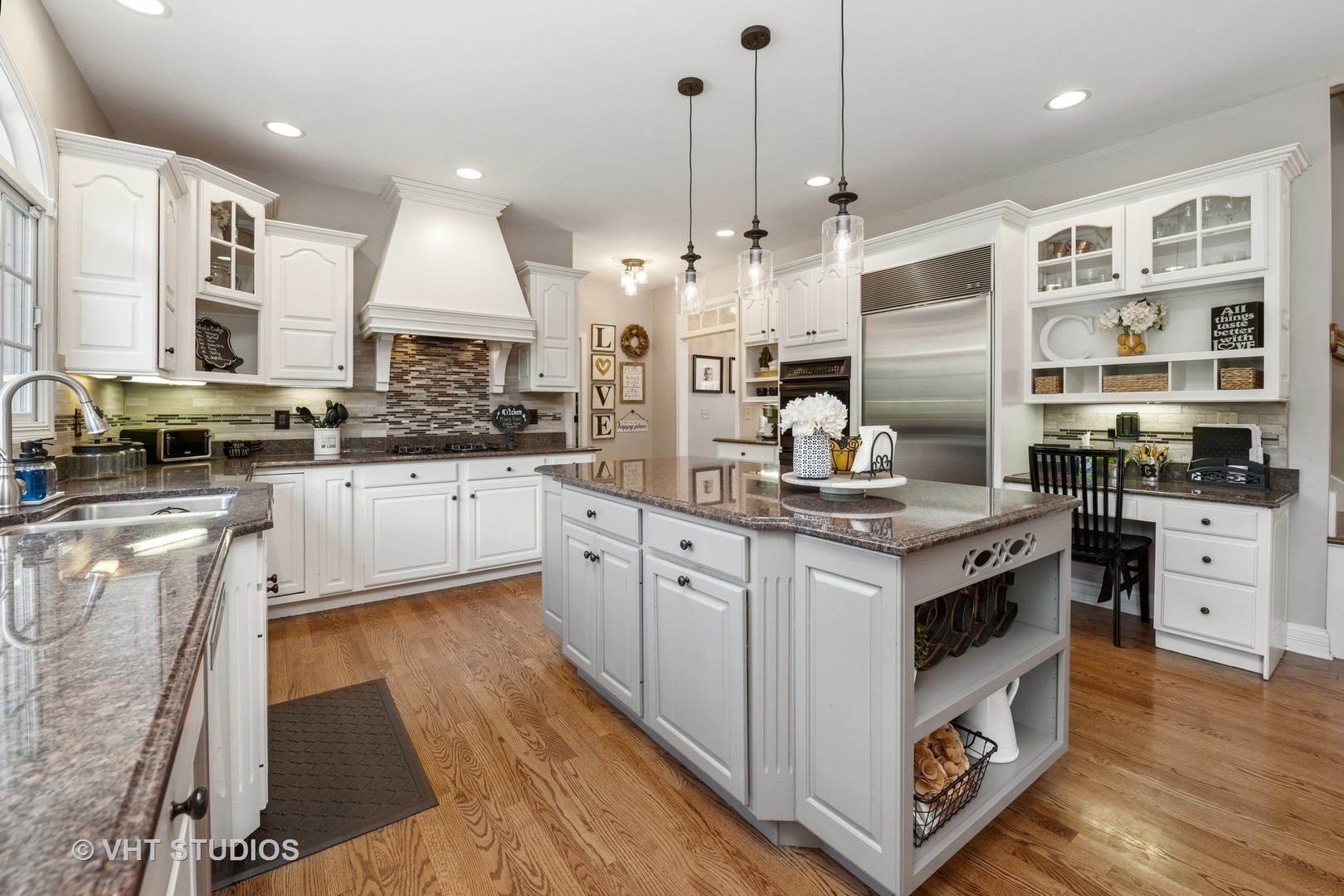 5609 Farmbrook Lane Crystal Lake, IL 60014 - Photo 8 of 35 a kitchen with stainless steel appliances granite countertop a stove and cabinets