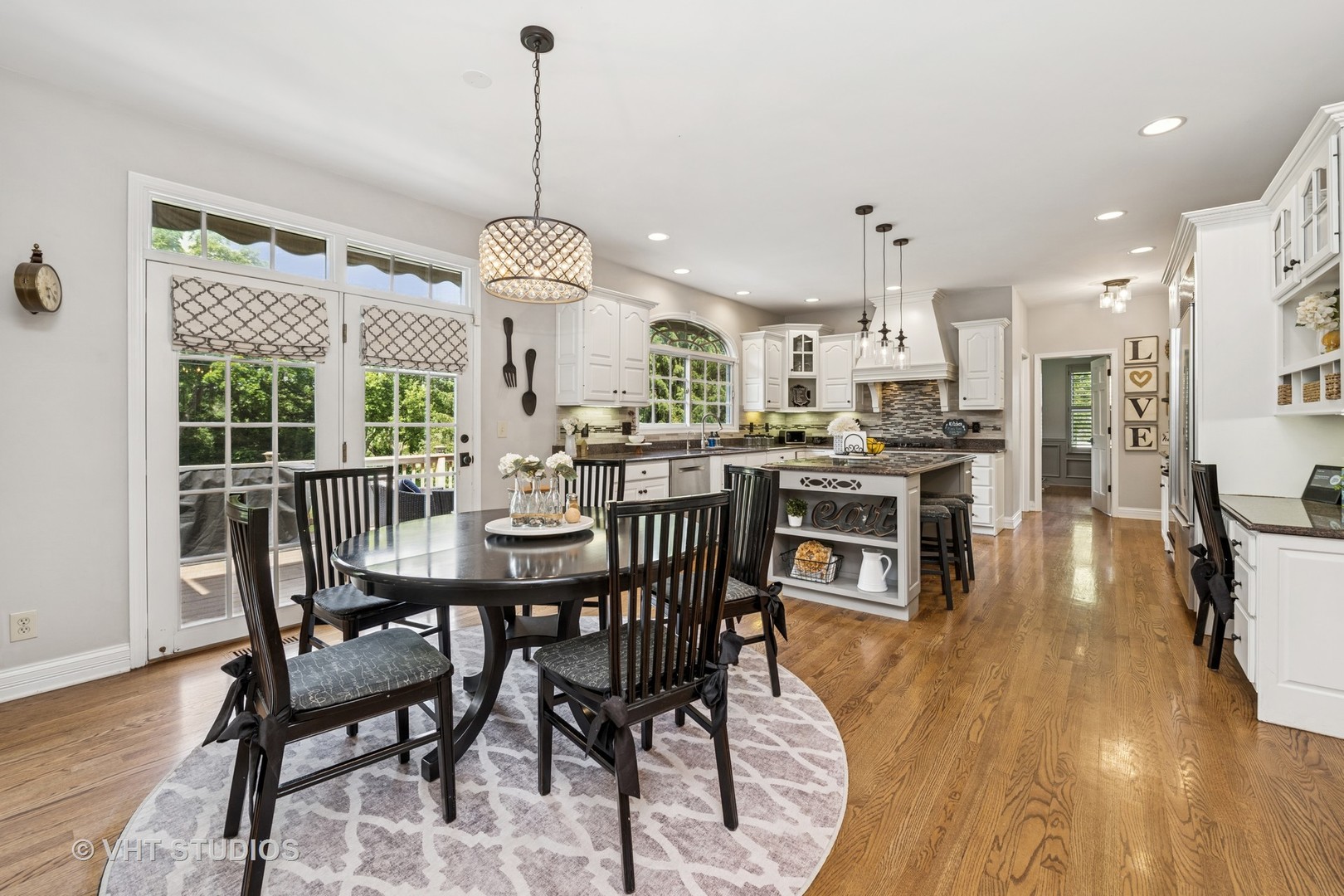 5609 Farmbrook Lane Crystal Lake, IL 60014 - Photo 9 of 35 a view of a dining room with furniture window and wooden floor
