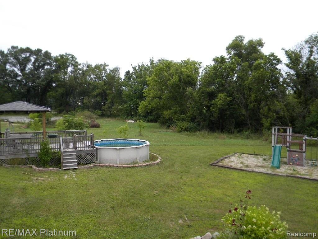 5321 Bradley Road Gregory, MI 48137 - Photo 35 of 35 Pool with Cabana
