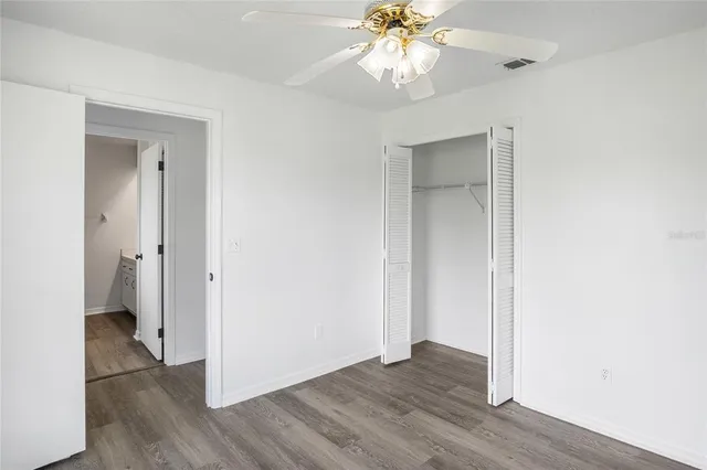 a view of a house with yard and a garden