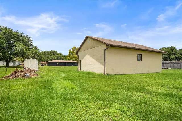 a view of a house with a big yard