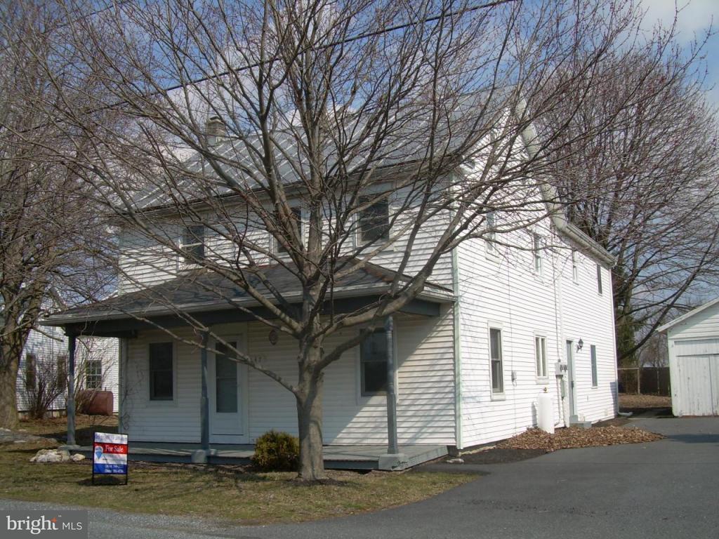 147 Chestnut Street Lititz, PA 17543 - Photo 1 of 13 a view of a white house with a large tree