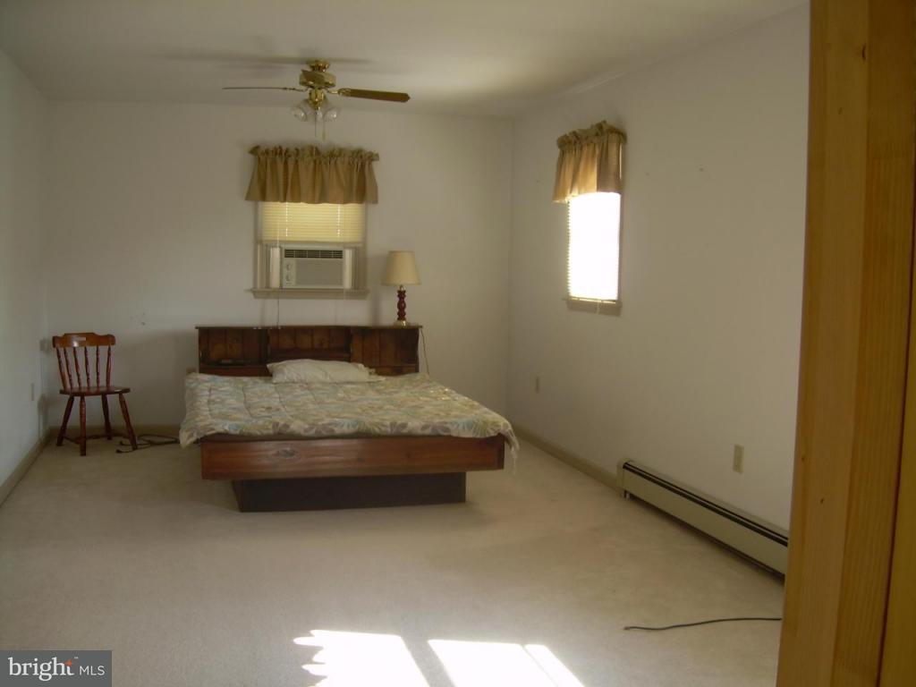147 Chestnut Street Lititz, PA 17543 - Photo 11 of 13 a bedroom with a bed and a window