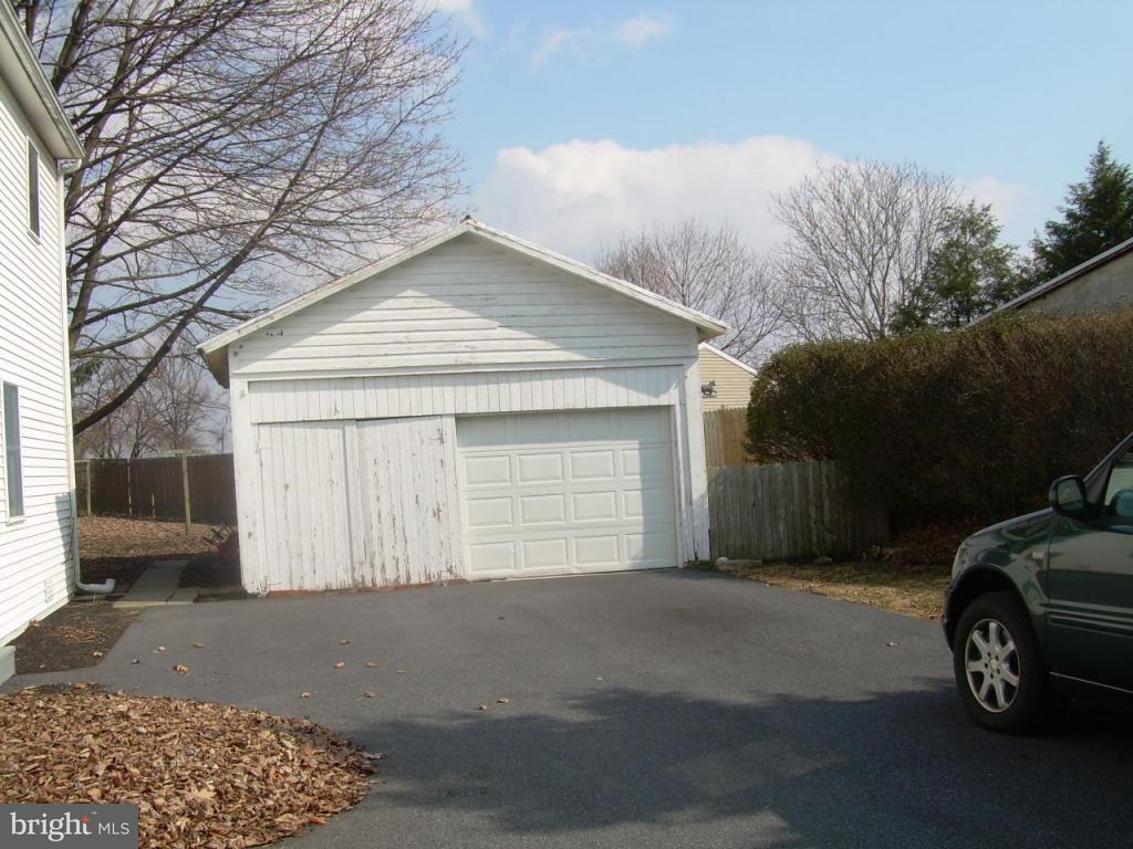 147 Chestnut Street Lititz, PA 17543 - Photo 3 of 13 a car parked in front of white house