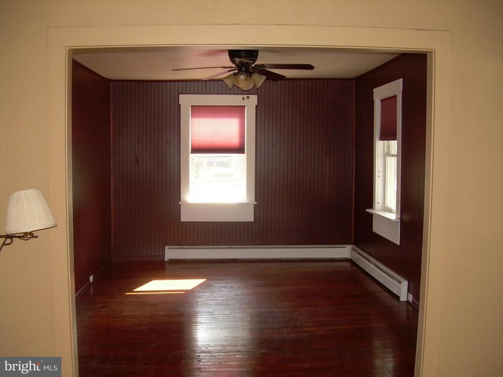 147 Chestnut Street Lititz, PA 17543 - Photo 9 of 13 a view of an empty room with wooden floor and a window