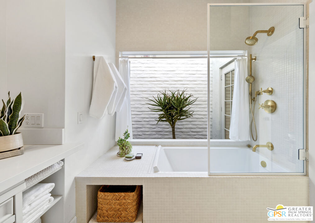 47420 Rabat Drive Palm Desert, CA 92260 - Photo 11 of 27 a bathroom with a bathtub and a sink