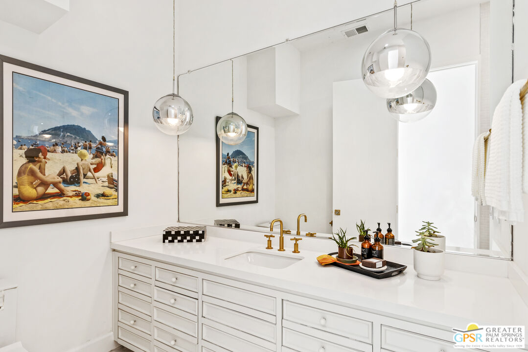 47420 Rabat Drive Palm Desert, CA 92260 - Photo 13 of 27 a bathroom with a sink and a mirror