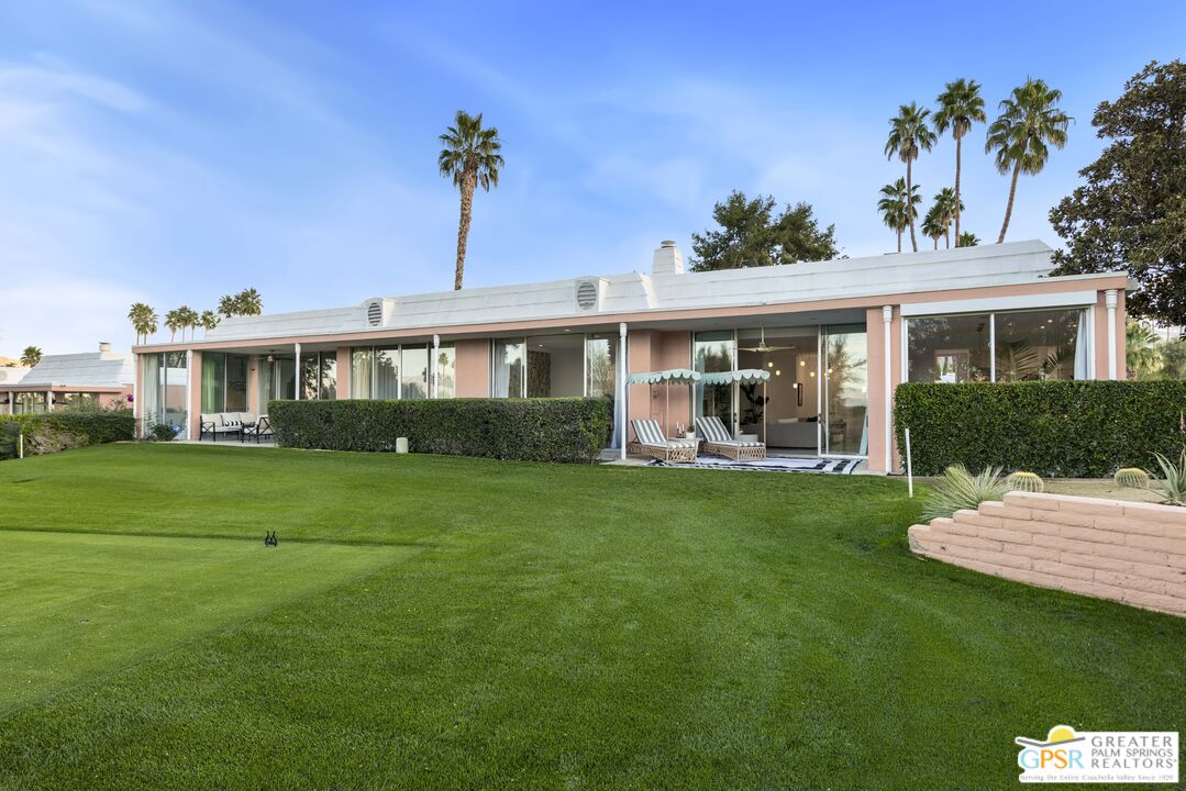 47420 Rabat Drive Palm Desert, CA 92260 - Photo 16 of 27 a view of a house with a yard