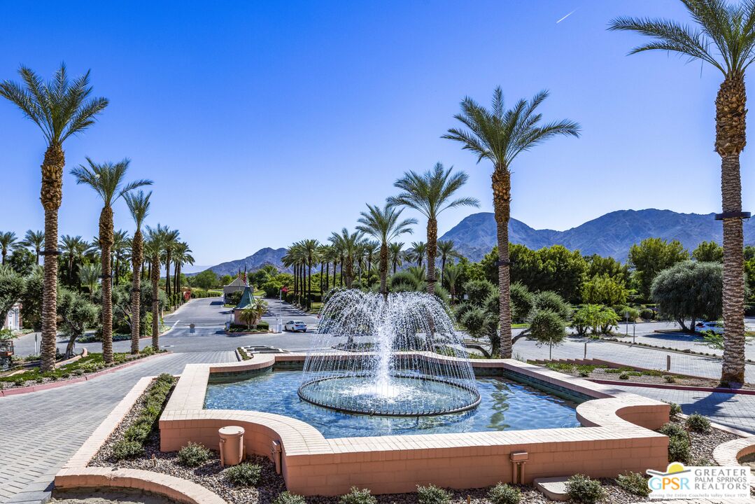 47420 Rabat Drive Palm Desert, CA 92260 - Photo 19 of 27 a view of a swimming pool with a patio and a yard