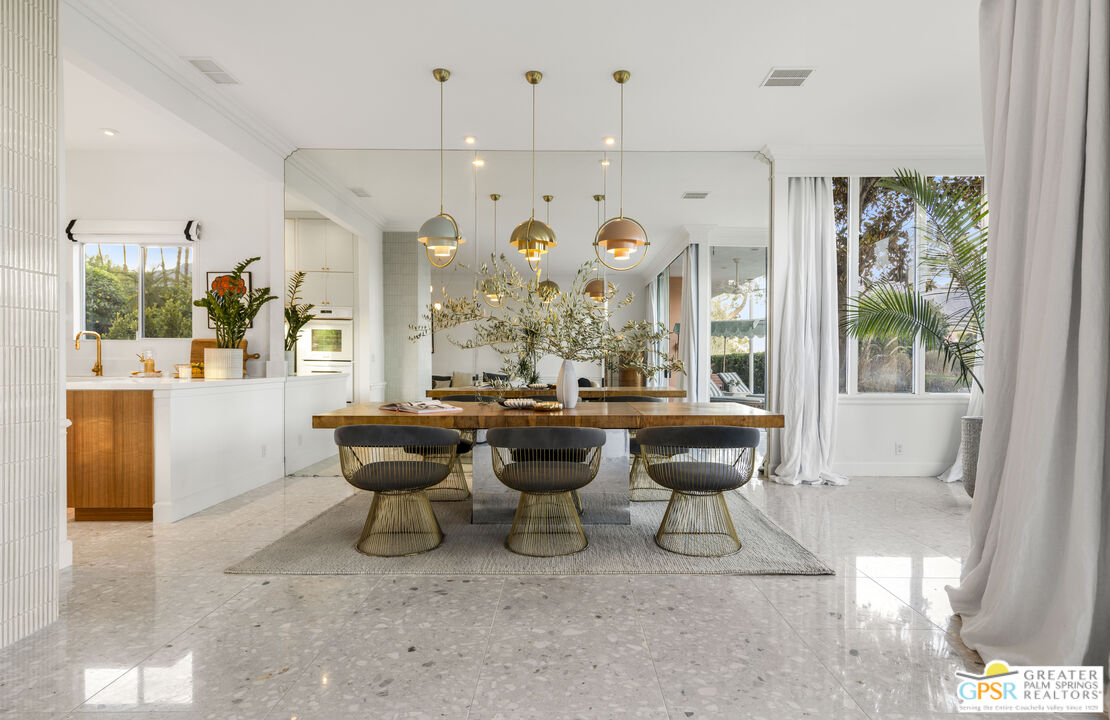 47420 Rabat Drive Palm Desert, CA 92260 - Photo 25 of 27 a room with lots of white furniture and a large window