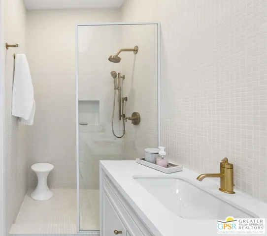 a bathroom with a sink and a mirror