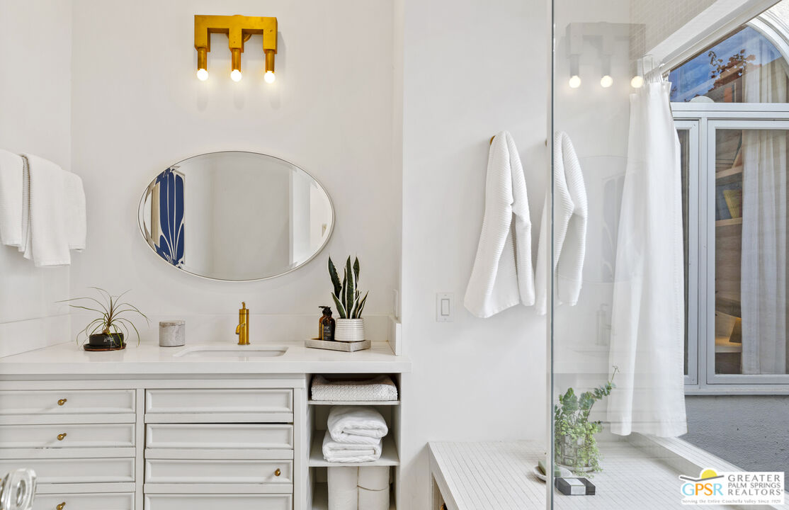 47420 Rabat Drive Palm Desert, CA 92260 - Photo 10 of 27 a bathroom with a sink and a mirror