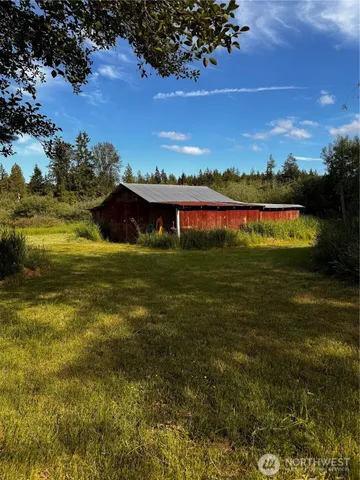 a view of a lake with a big yard