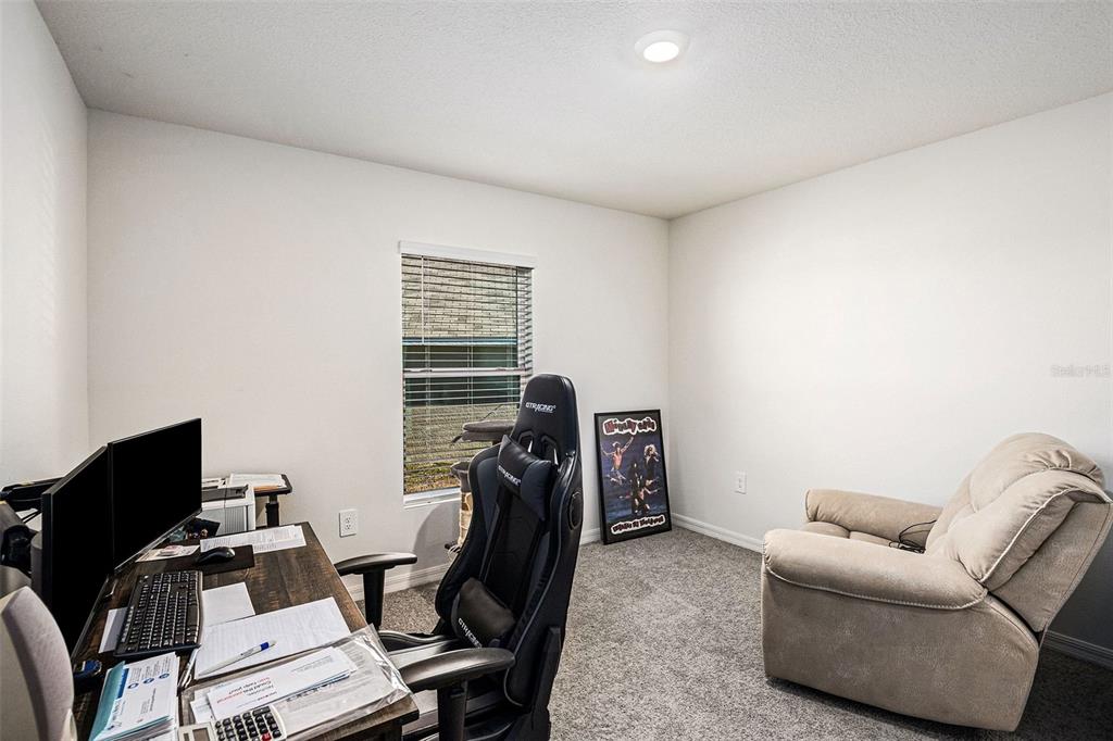 4992 North Fairways Ridge Point Beverly Hills, FL 34465 - Photo 11 of 14 a view of workspace with wooden floor windows