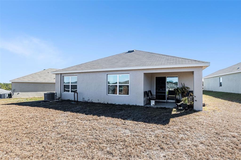 4992 North Fairways Ridge Point Beverly Hills, FL 34465 - Photo 14 of 14 a front view of a house with a yard
