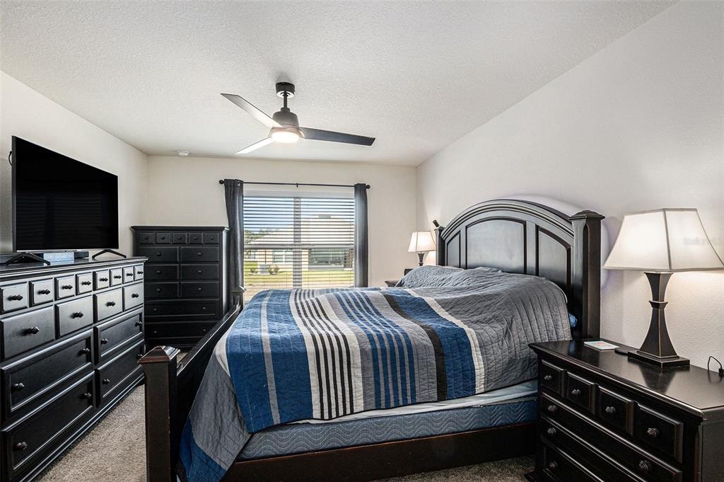 4992 North Fairways Ridge Point Beverly Hills, FL 34465 - Photo 6 of 14 a bedroom with a bed and a flat screen tv