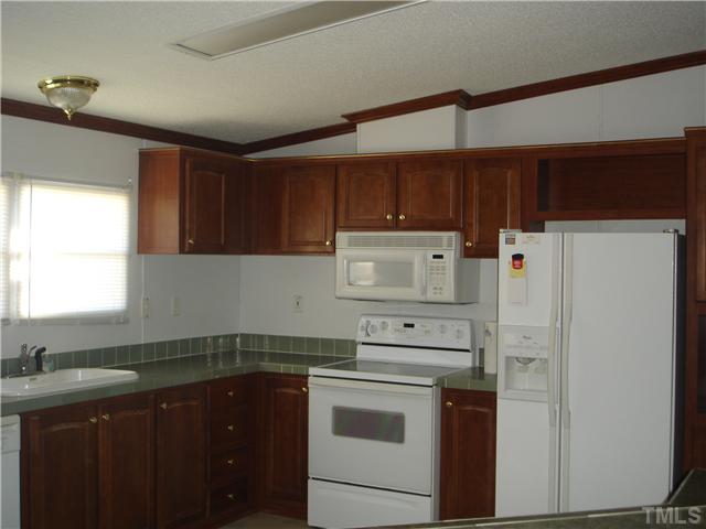 2575 Langdon Road Angier, NC 27501 - Photo 5 of 21 Gourmet Kitchen. Custom Cabinetry.