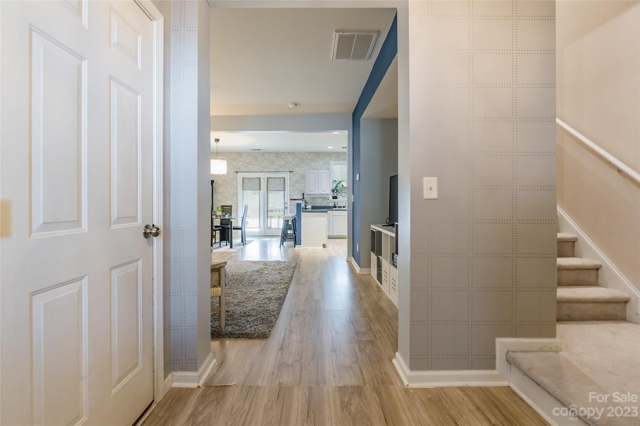 617 Potter Place Road Fort Mill, SC 29708 - Photo 3 of 26 a view of a hallway view with wooden floor and staircase