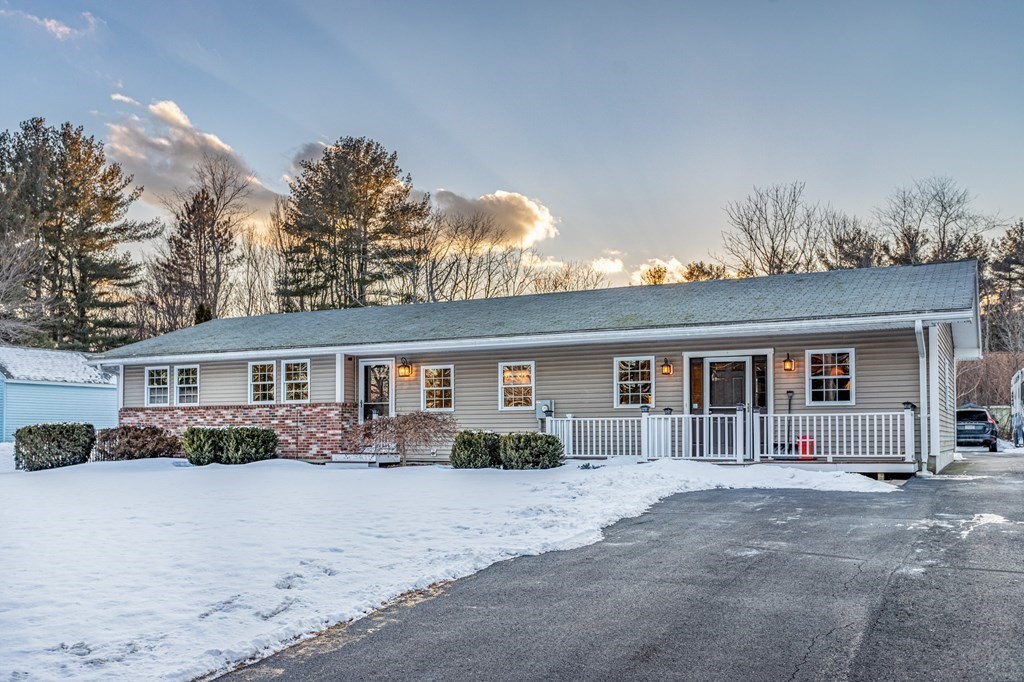 8 Brown Road Shirley, MA 01464 - Photo 1 of 42 a view of a house with a yard and large tree