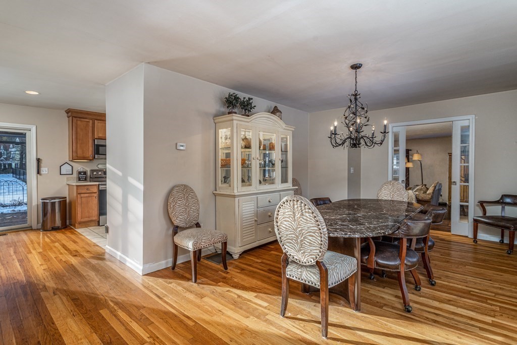 8 Brown Road Shirley, MA 01464 - Photo 13 of 42 a view of a dining room with furniture and wooden floor