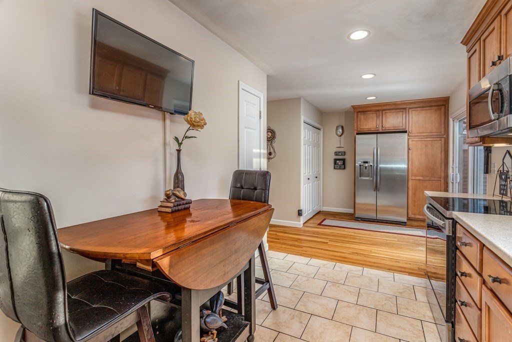 8 Brown Road Shirley, MA 01464 - Photo 18 of 42 a outdoor dining space with furniture and a flat screen tv