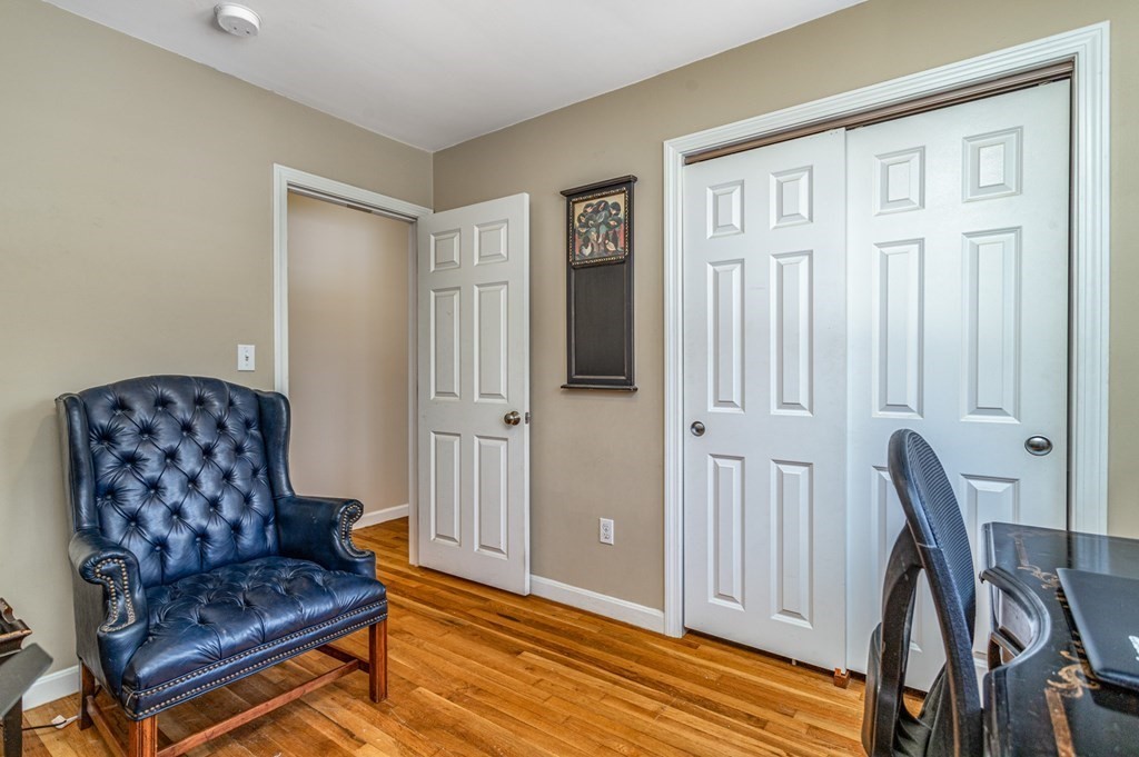 8 Brown Road Shirley, MA 01464 - Photo 26 of 42 a living room with furniture and a wooden floor