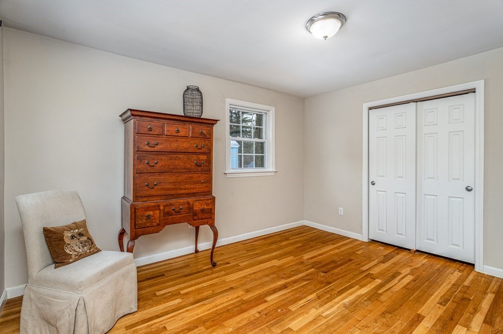 8 Brown Road Shirley, MA 01464 - Photo 29 of 42 a bedroom with a bed and furniture
