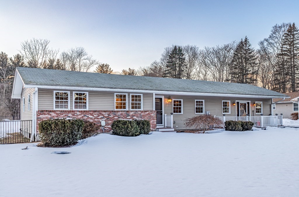 8 Brown Road Shirley, MA 01464 - Photo 3 of 42 a front view of a house with a yard