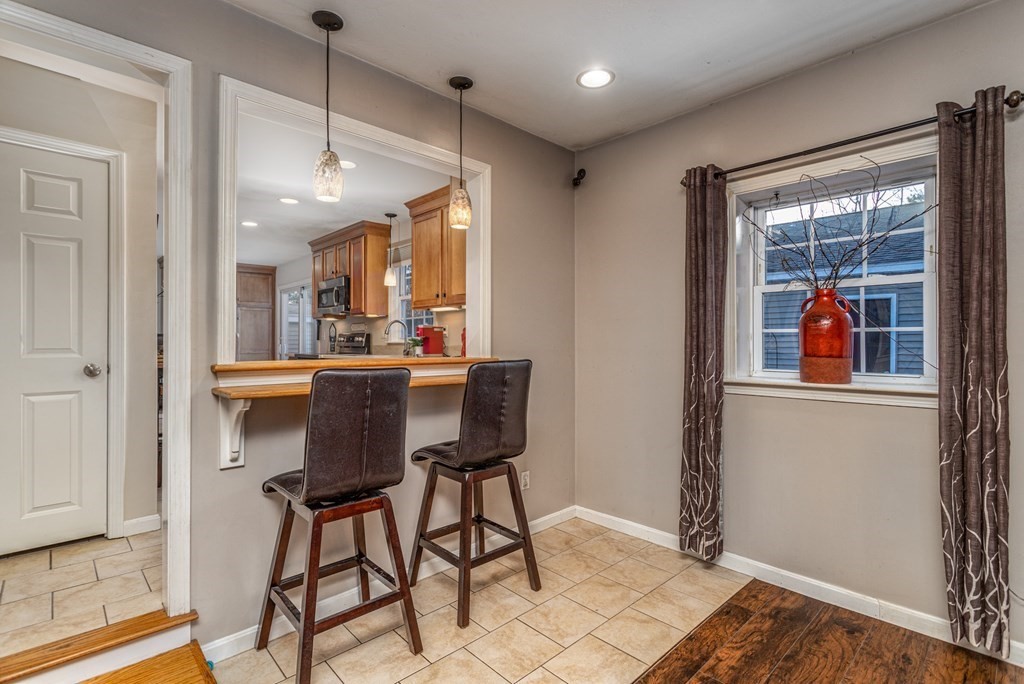 8 Brown Road Shirley, MA 01464 - Photo 8 of 42 a view of a dining room with furniture window and wooden floor
