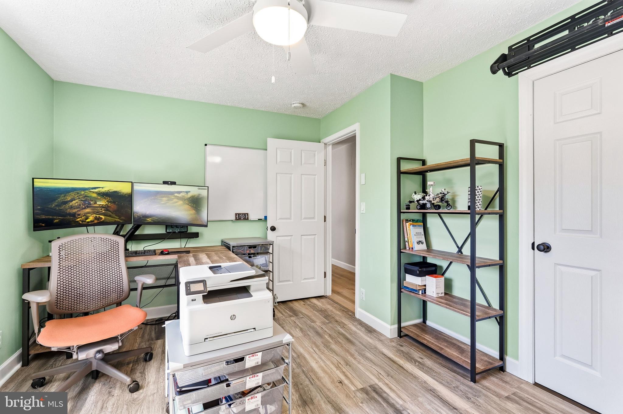 458 Tonys Road Elkton, MD 21921 - Photo 20 of 27 a kitchen with stainless steel appliances kitchen island granite countertop a stove and a refrigerator