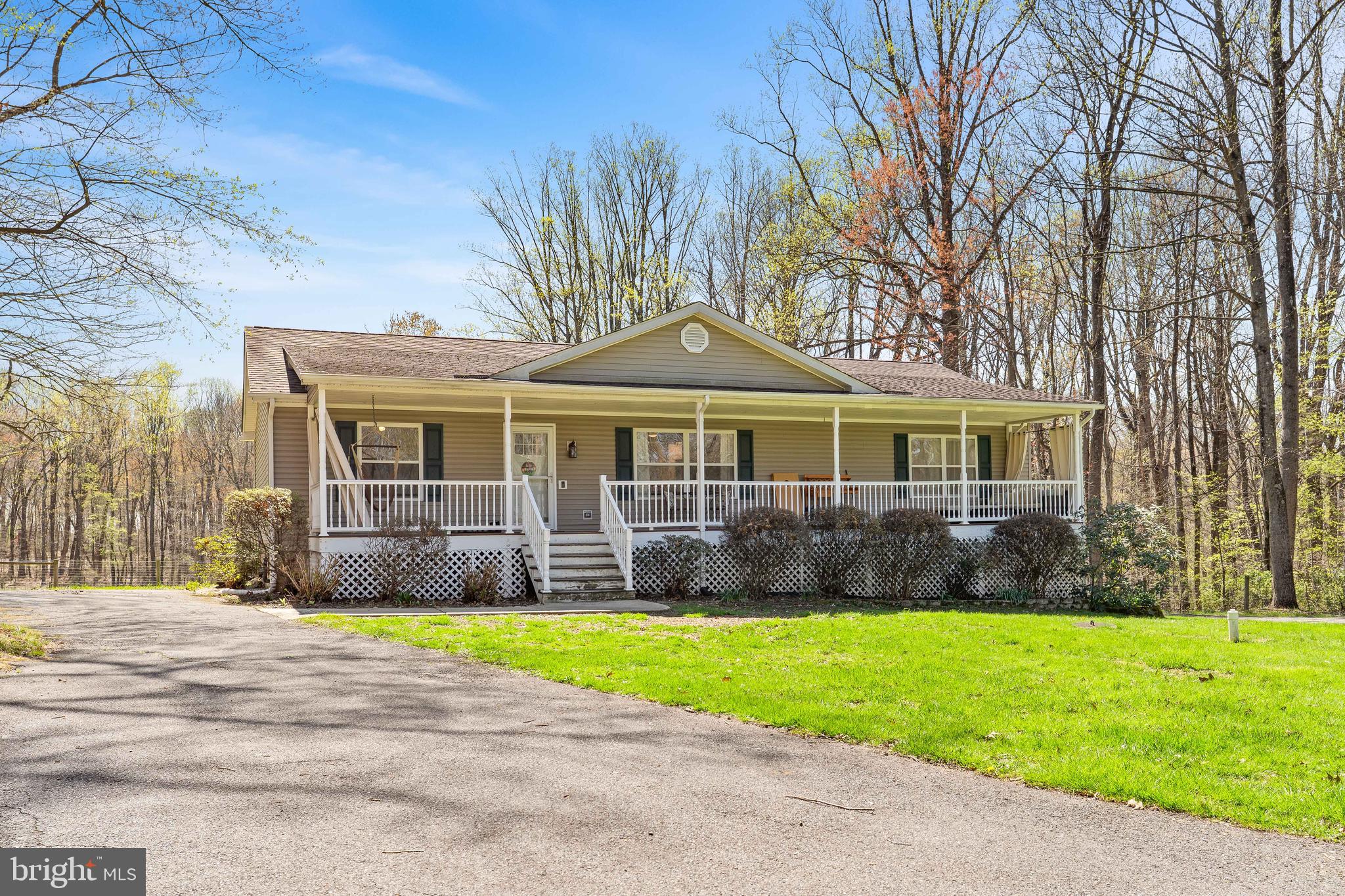 458 Tonys Road Elkton, MD 21921 - Photo 2 of 27 a front view of a house with a yard