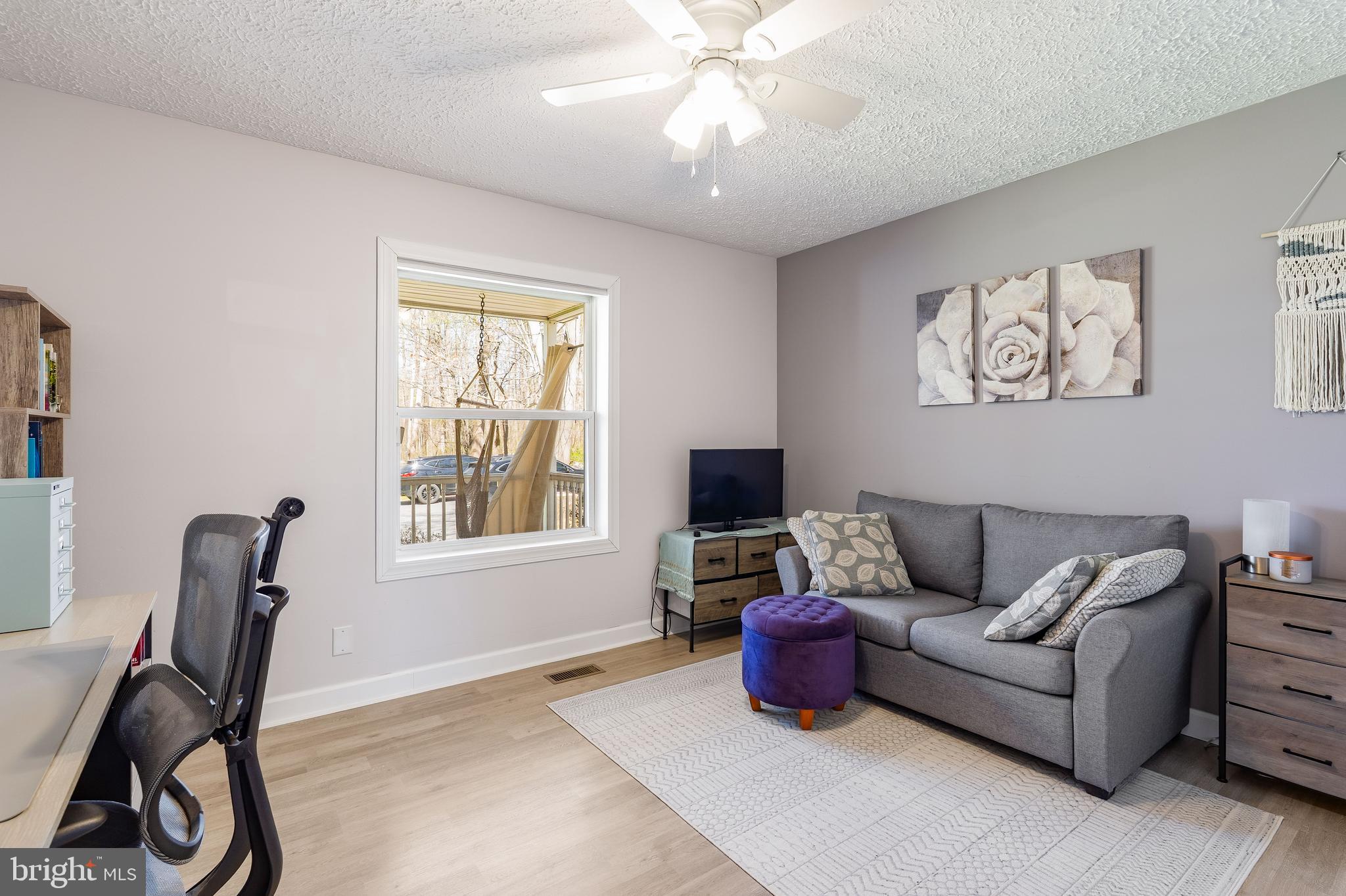 458 Tonys Road Elkton, MD 21921 - Photo 21 of 27 a living room with furniture a air conditioner and a window