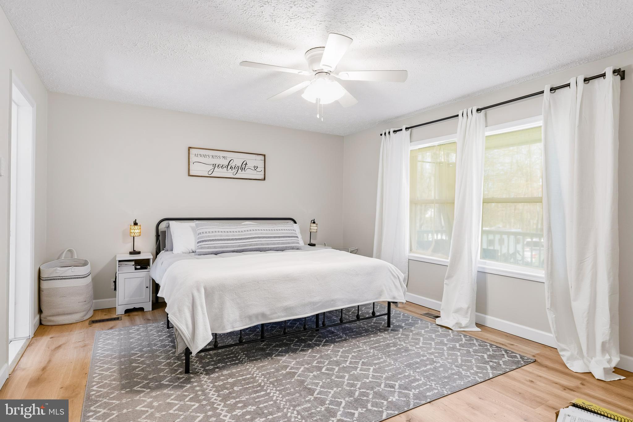 458 Tonys Road Elkton, MD 21921 - Photo 22 of 27 a bedroom with a large bed and a window