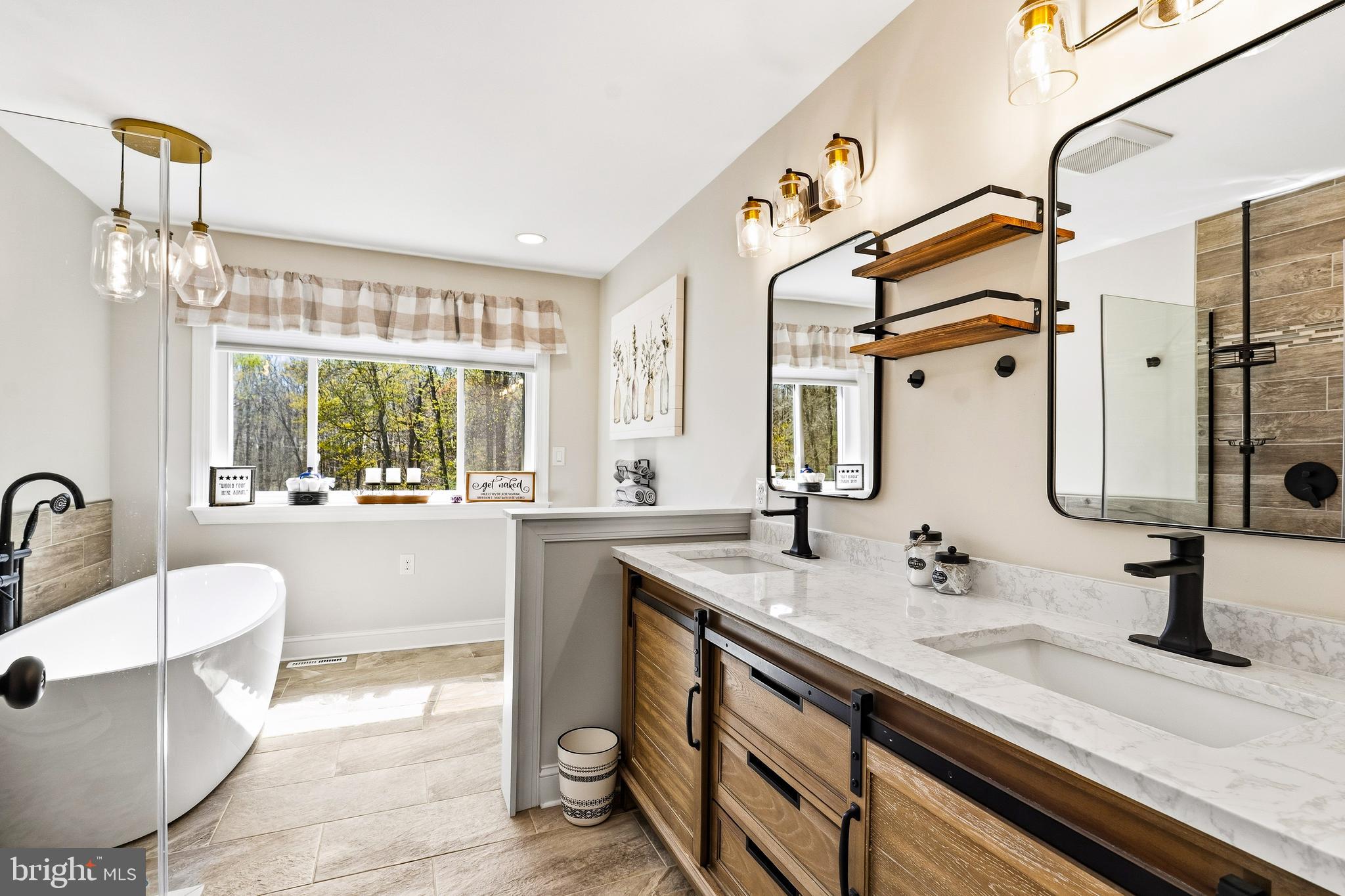 458 Tonys Road Elkton, MD 21921 - Photo 24 of 27 a bathroom with a sink double vanity and a mirror
