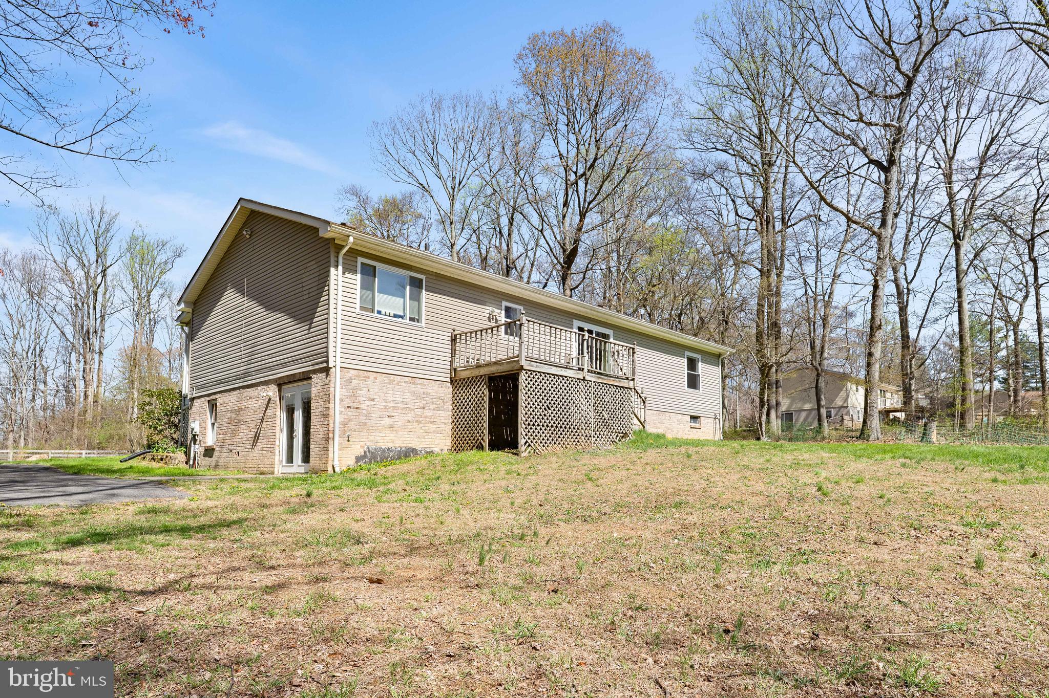 458 Tonys Road Elkton, MD 21921 - Photo 8 of 27 a white house that has a tree in front of it