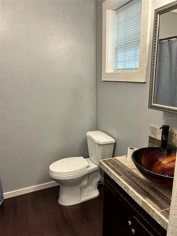 a bathroom with a sink and a toilet