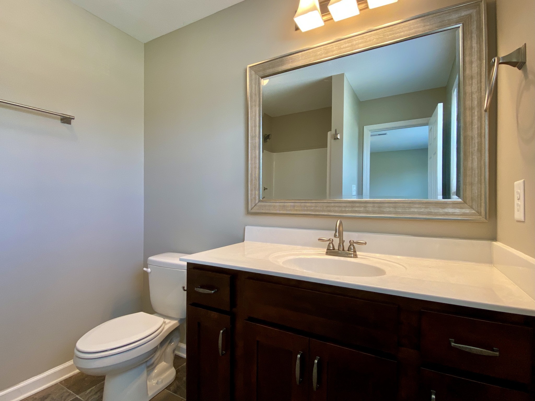 951 Hugh Hunter Road Oak Grove, KY 42262 - Photo 23 of 35 a bathroom with a sink and a toilet