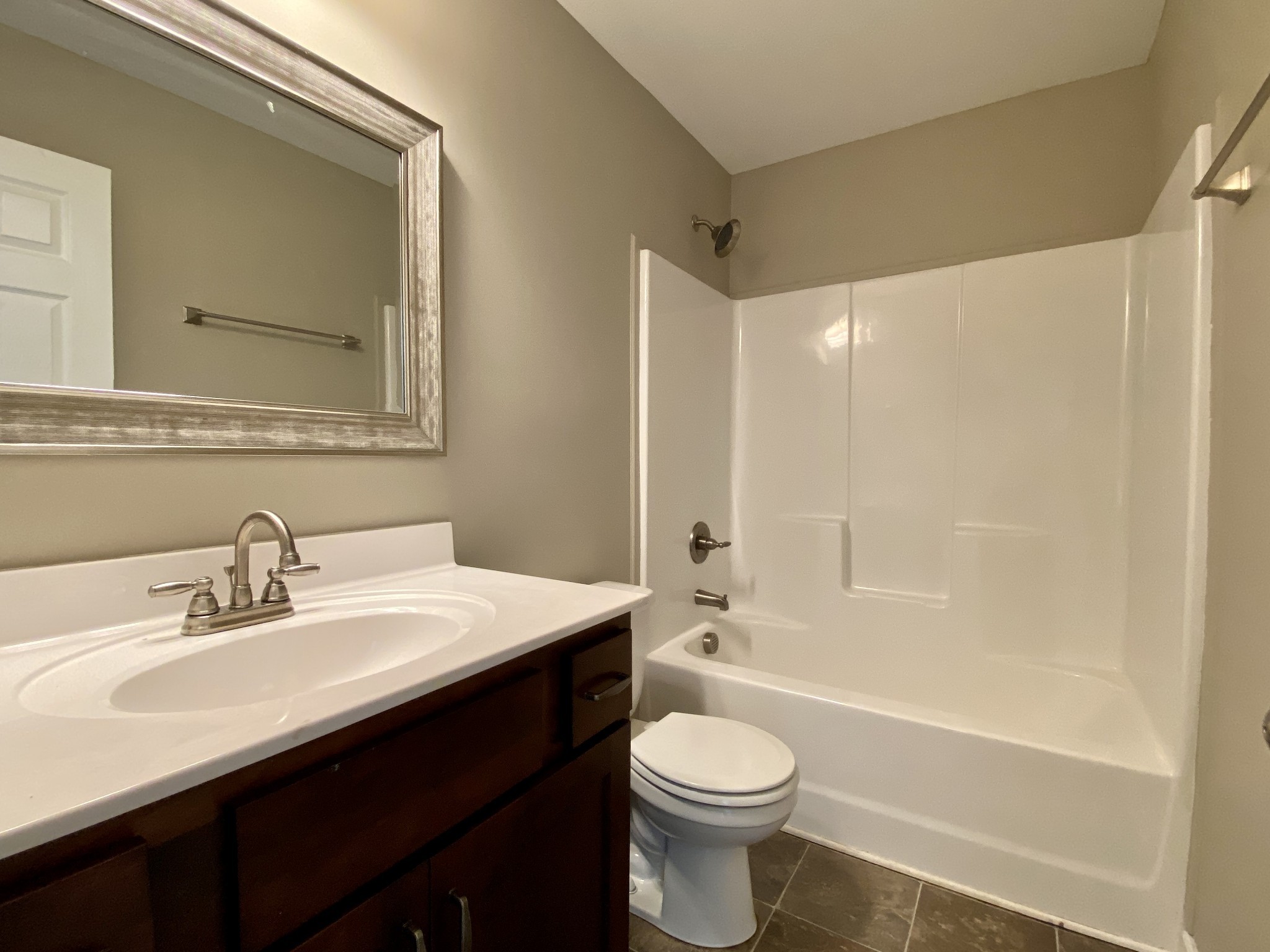 951 Hugh Hunter Road Oak Grove, KY 42262 - Photo 25 of 35 a bathroom with a sink a toilet and a bathtub