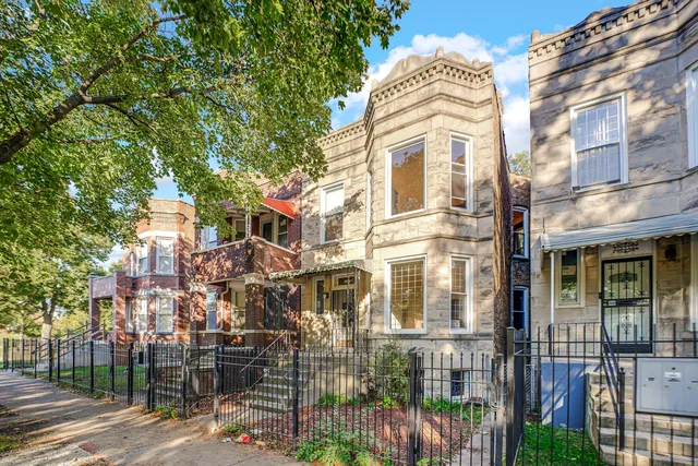 a front view of a multi story residential apartment building