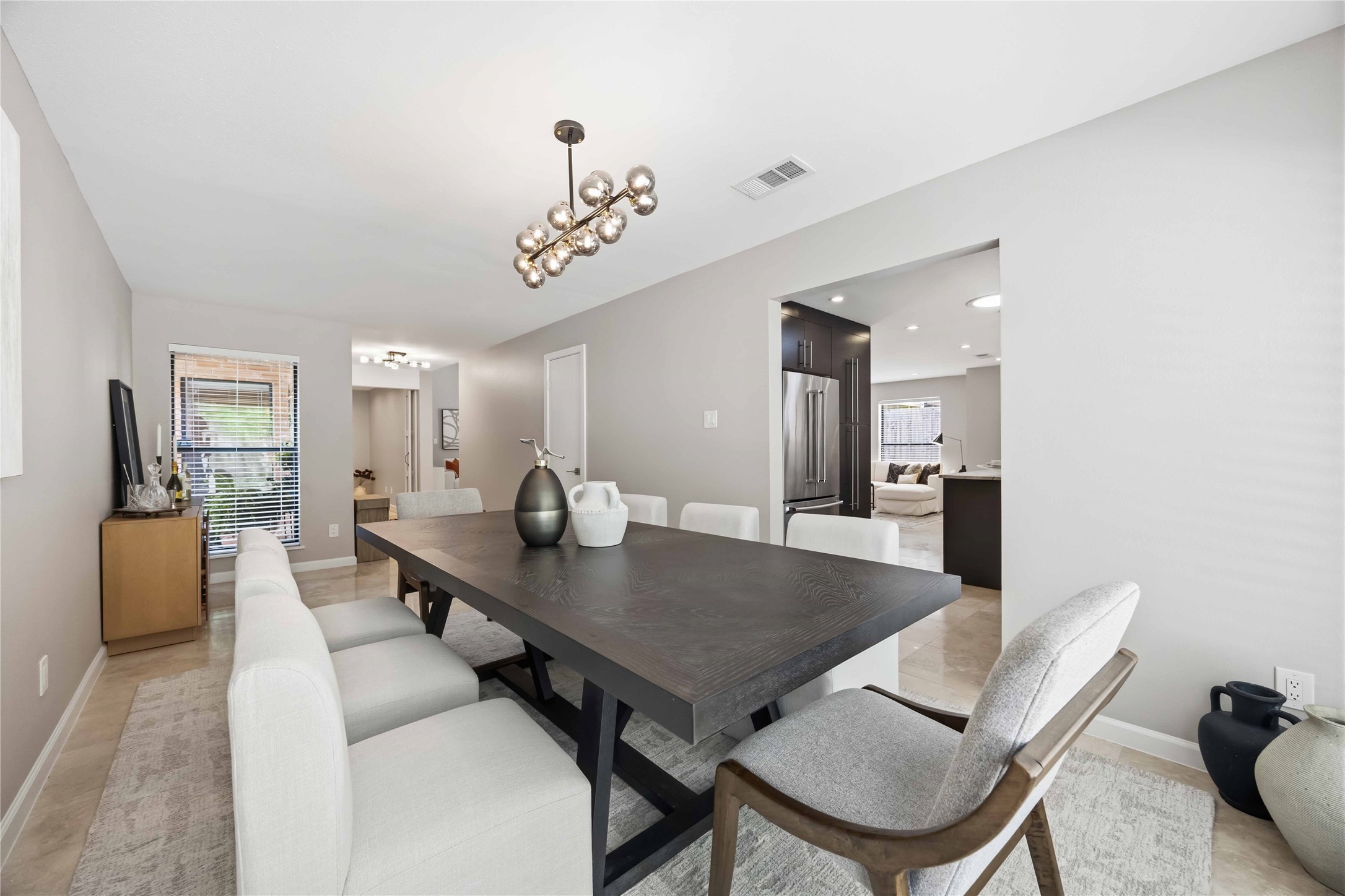 619 Rancho Bauer Drive Houston, TX 77079 - Photo 4 of 46 A versatile living space designed to fit your lifestyle—perfect as a cozy family room for everyday relaxation or easily transformed into an elegant formal dining room for entertaining.