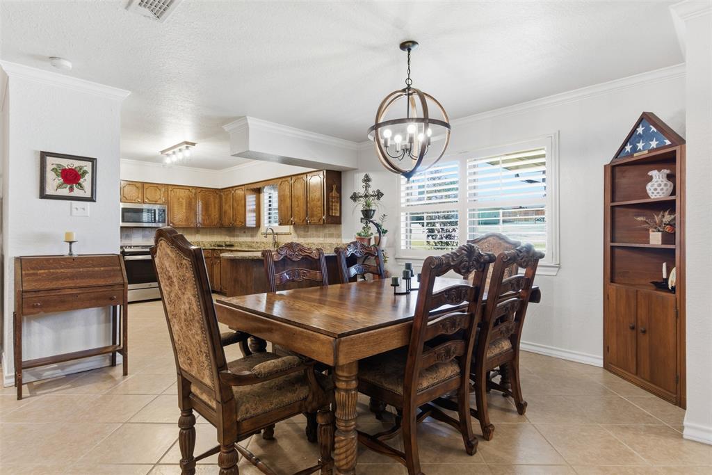 116 Cromeans Street Jacksboro, TX 76458 - Photo 9 of 32 a view of a dining room with furniture