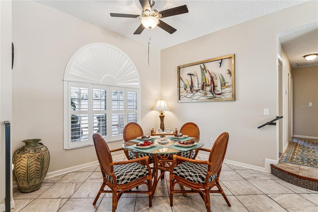 6324 India Drive Spring Hill, FL 34608 - Photo 25 of 68 a dining room with furniture and window