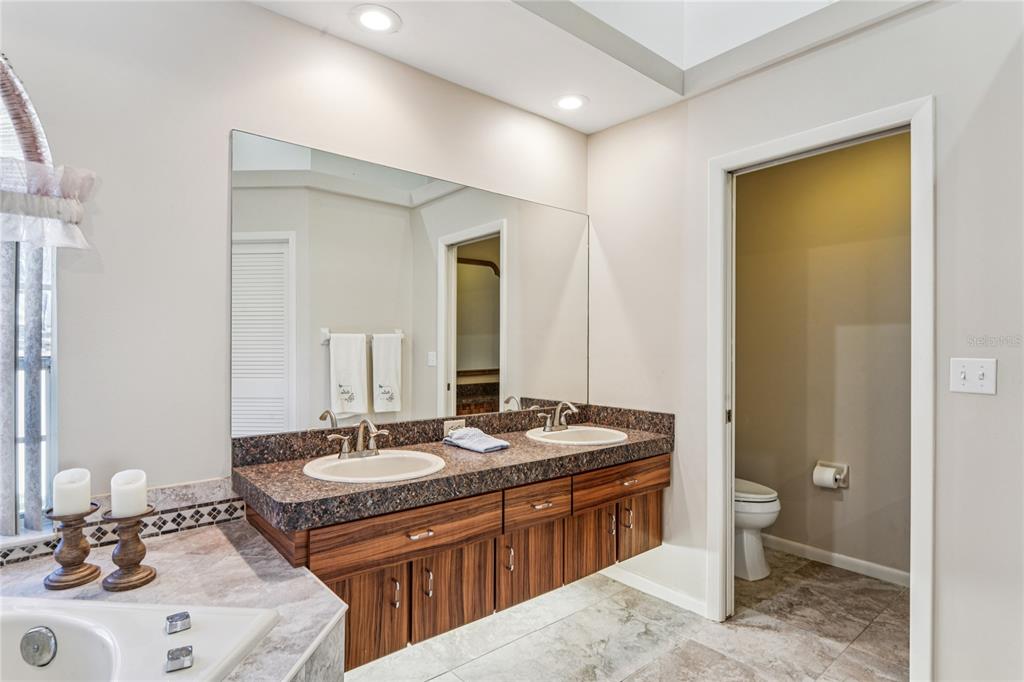 6324 India Drive Spring Hill, FL 34608 - Photo 31 of 68 a bathroom with a sink and a mirror