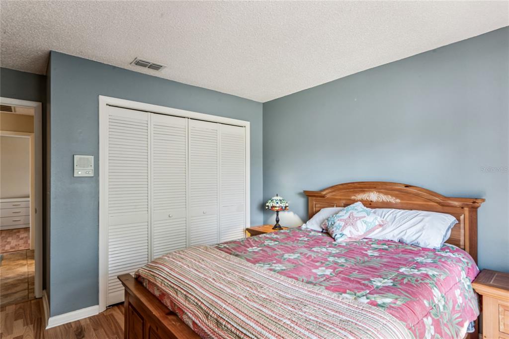 6324 India Drive Spring Hill, FL 34608 - Photo 42 of 68 a bedroom with a bed and a window