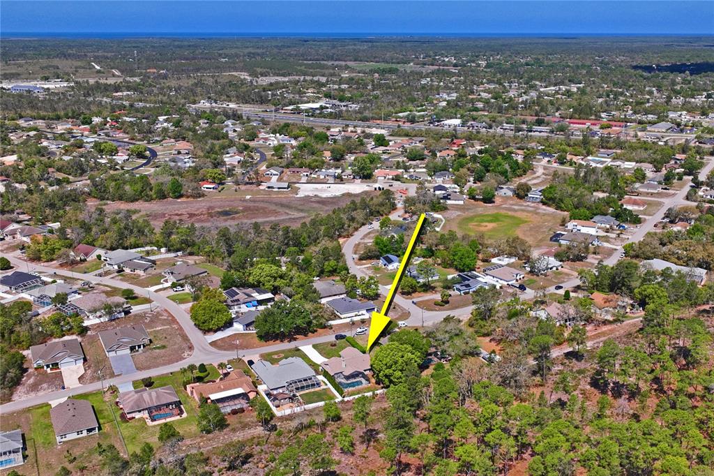 6324 India Drive Spring Hill, FL 34608 - Photo 67 of 68 an aerial view of residential house with outdoor space