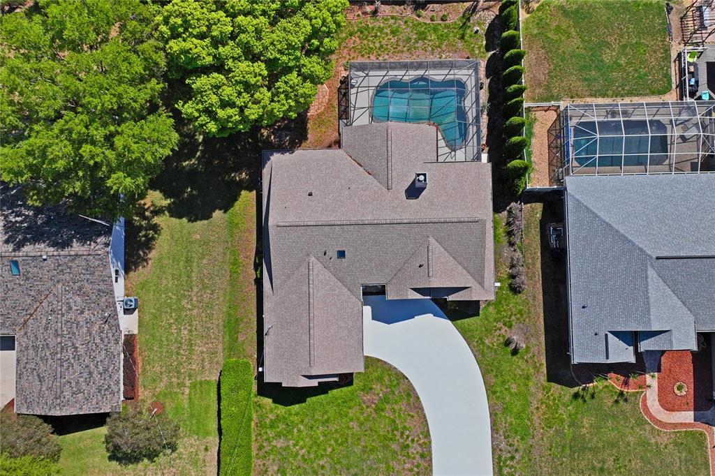 6324 India Drive Spring Hill, FL 34608 - Photo 68 of 68 an aerial view of a house with a yard