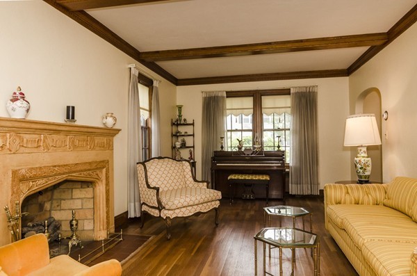 348 Russett Road Brookline, MA 02467 - Photo 3 of 18 a living room with furniture and a fireplace