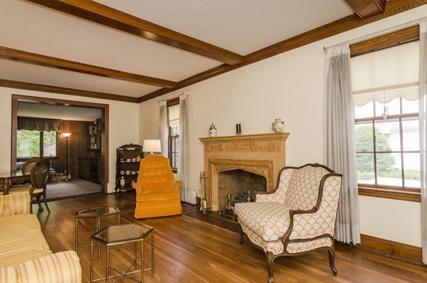 348 Russett Road Brookline, MA 02467 - Photo 4 of 18 a living room with furniture and a fireplace